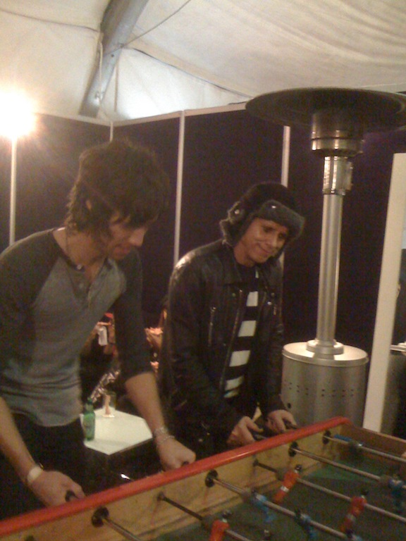 playing foozball backstage with teammate Martin Gore of Depeche Mode...