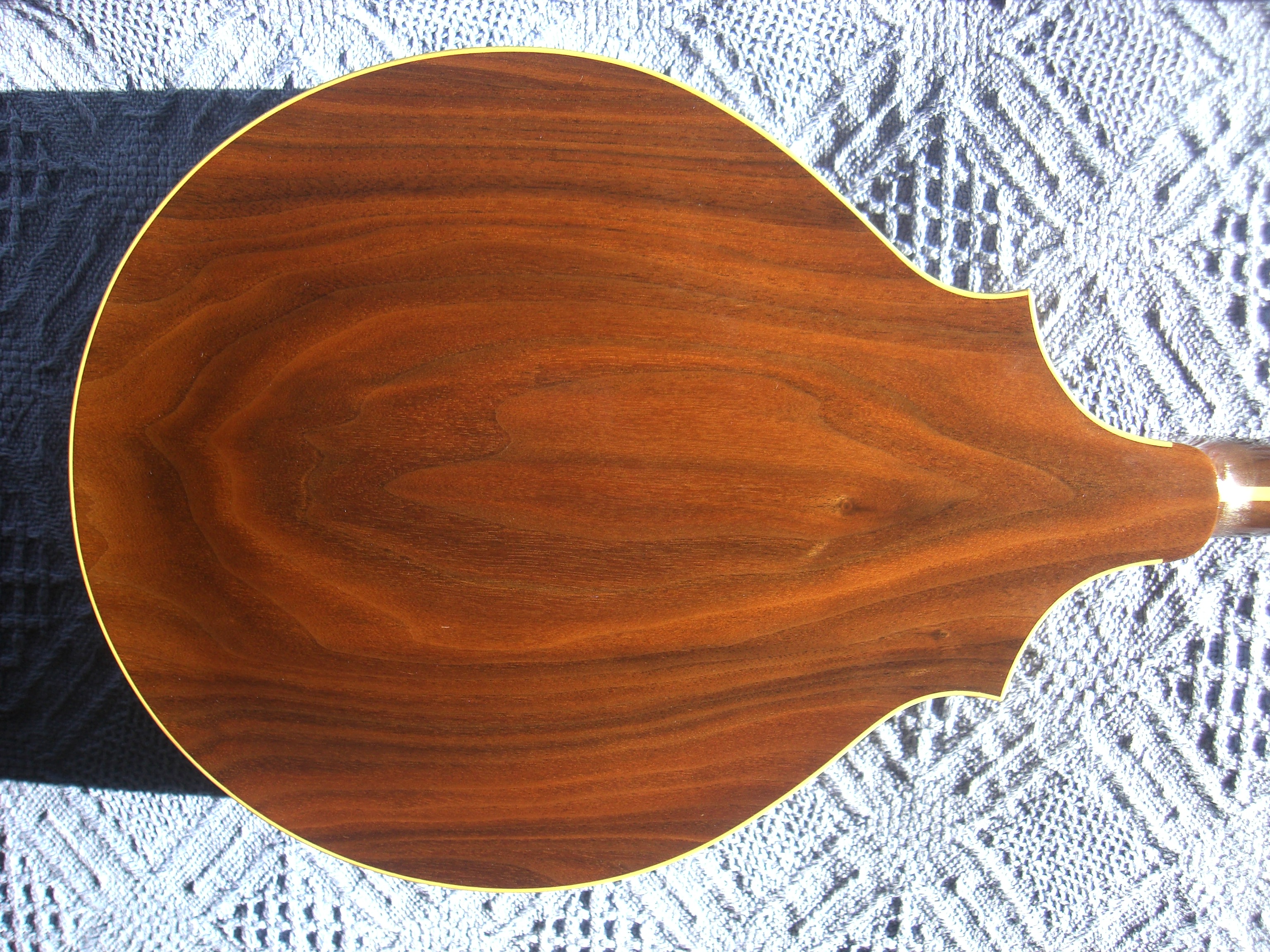 Carved walnut mandolin - back