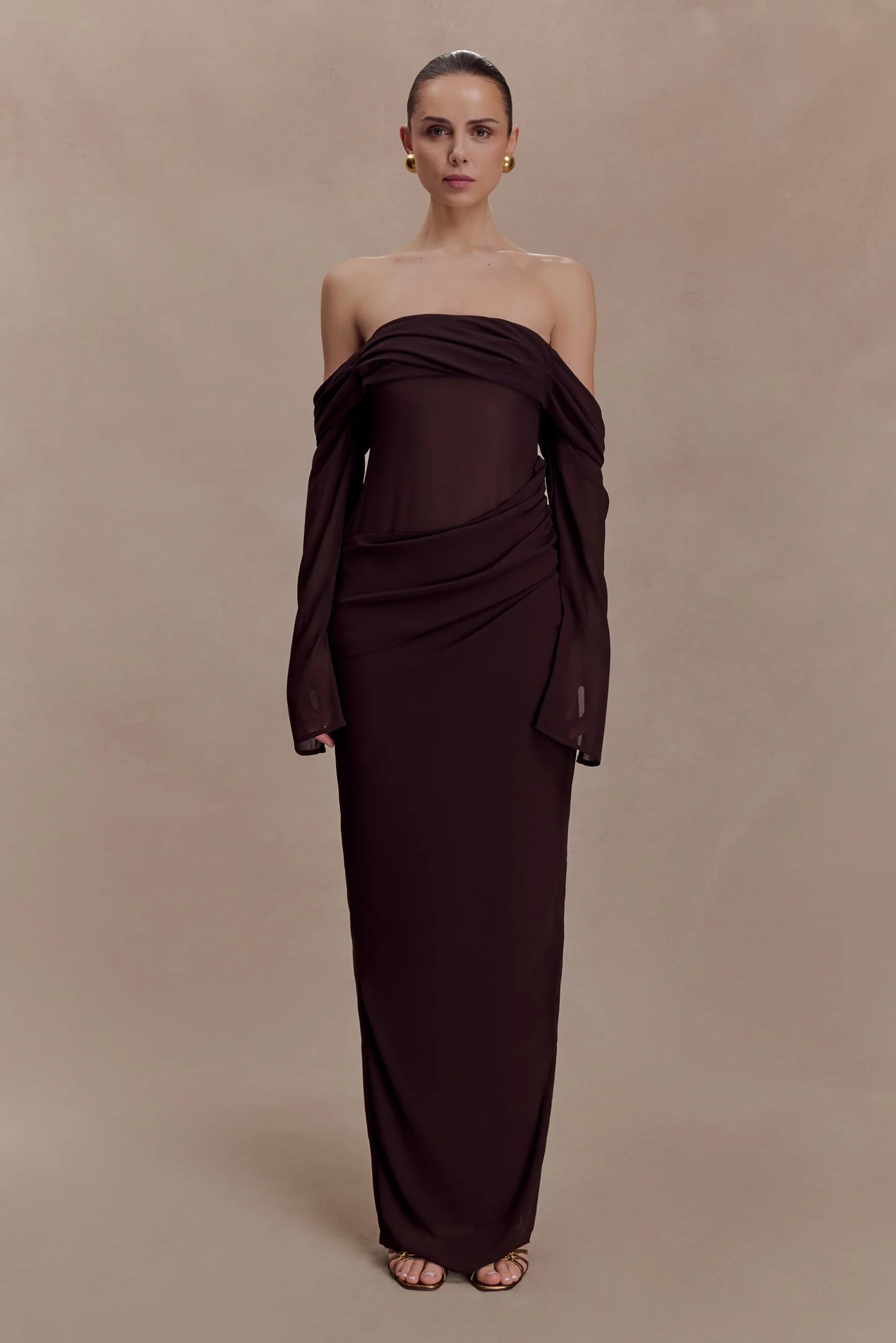 Long-sleeve maxi dress for an autumn wedding guest