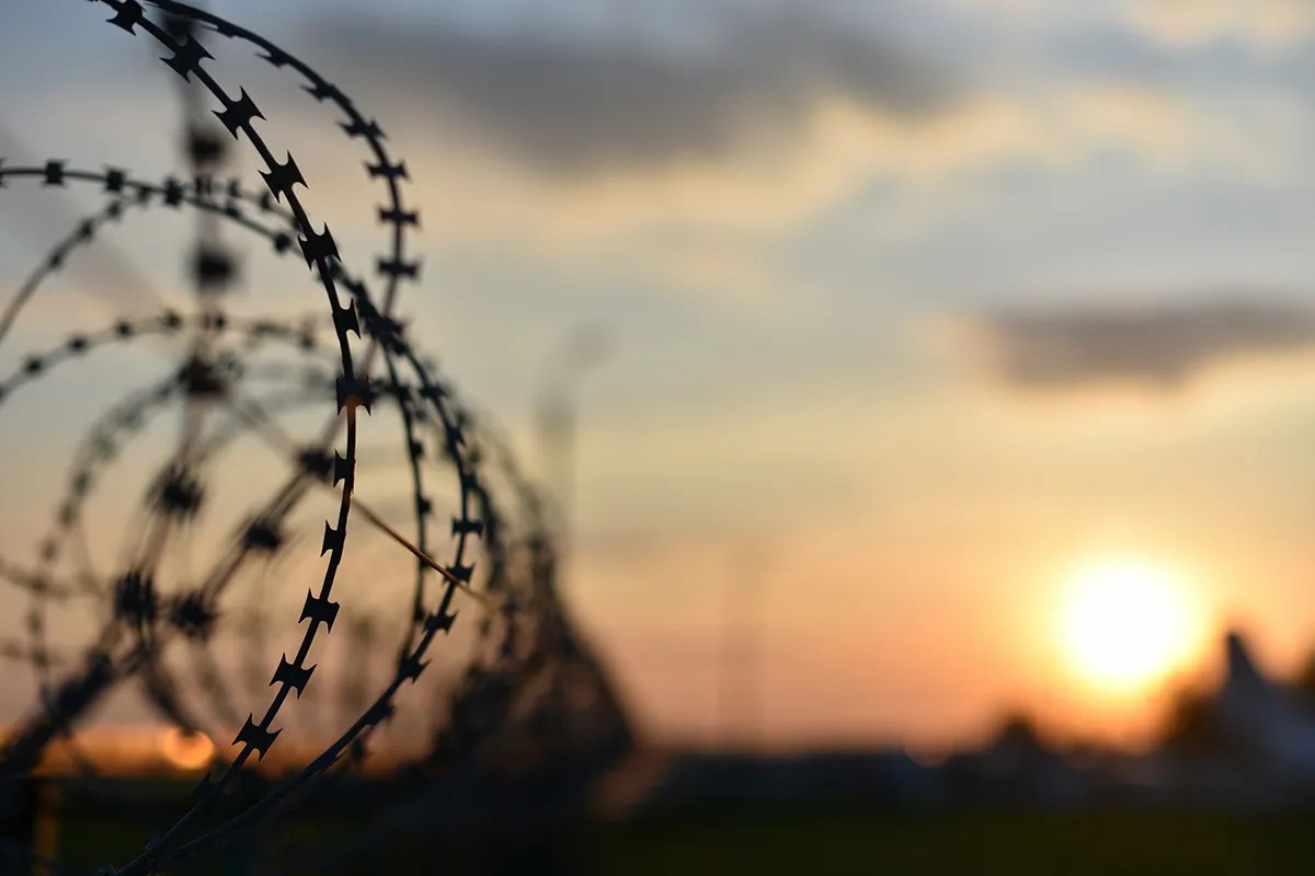 Barbed wire outside a prison.