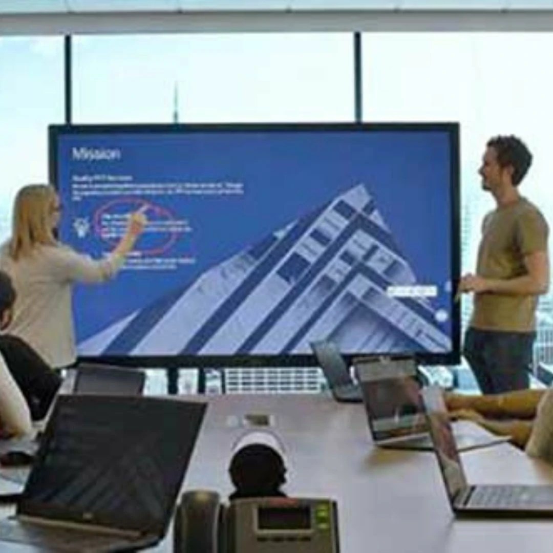 Business team discussing with an interactive display integration