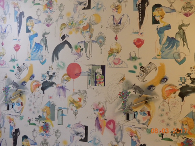 Wallpaper in hallway to toilets