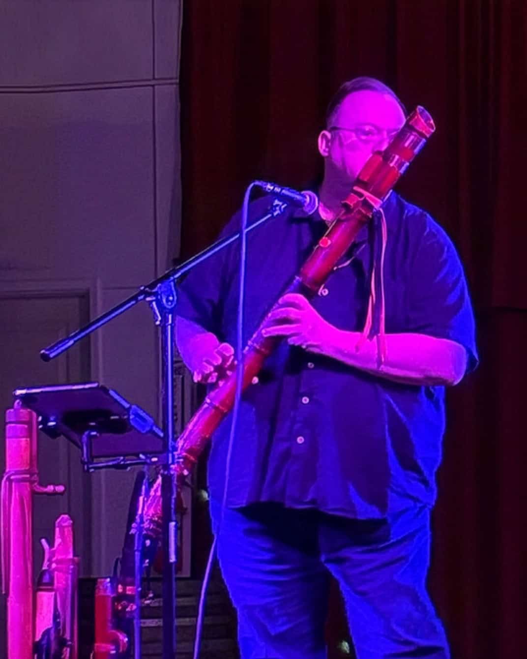 Bryan Quinn and his lowest flute perform at Two Rivers Cider Company in Sacramento.