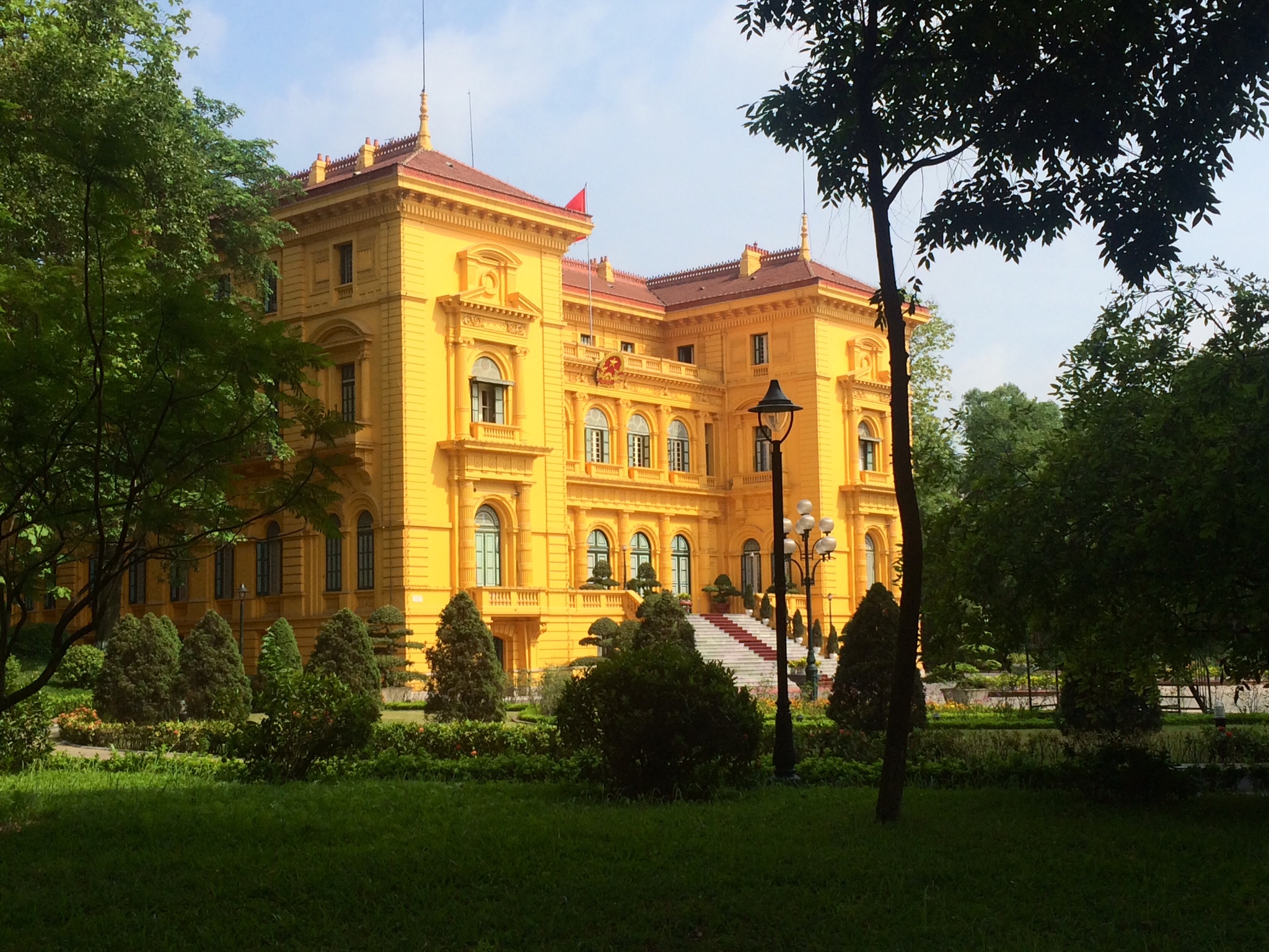 Vietnamese Presidential Palace- viewable directly after the mausoleum. Tourists can't walk any closer than this.