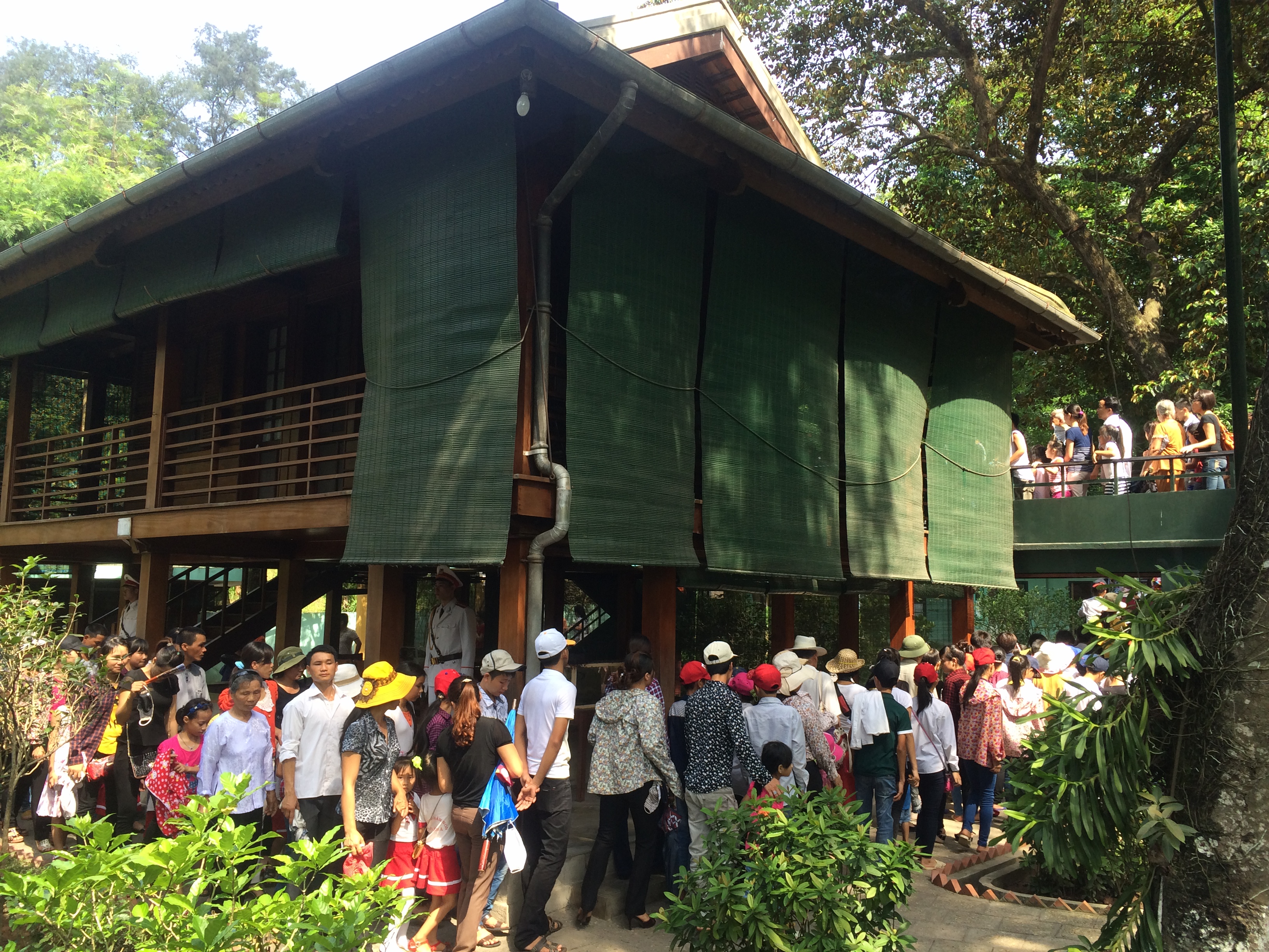 Swarms of people trying to see the house on stilts.