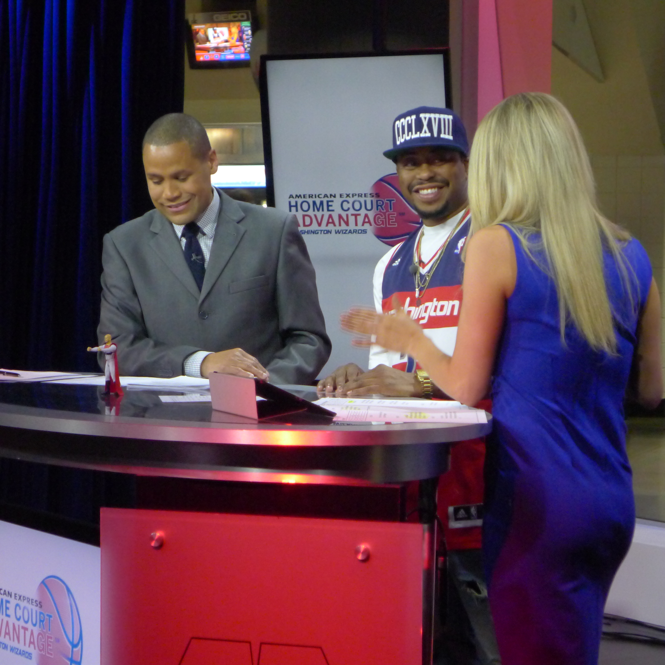 Jumoke Davis, local Washington, D.C. music artist Raheem DeVaughn and Hayley Milon on set.