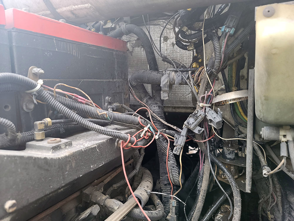 Chaos of extra wires in the engine compartment