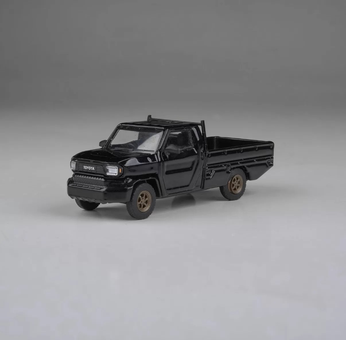 Para64 1/64 - 2025 Toyota Hilux Champ Tamaraw Black - PB-65702