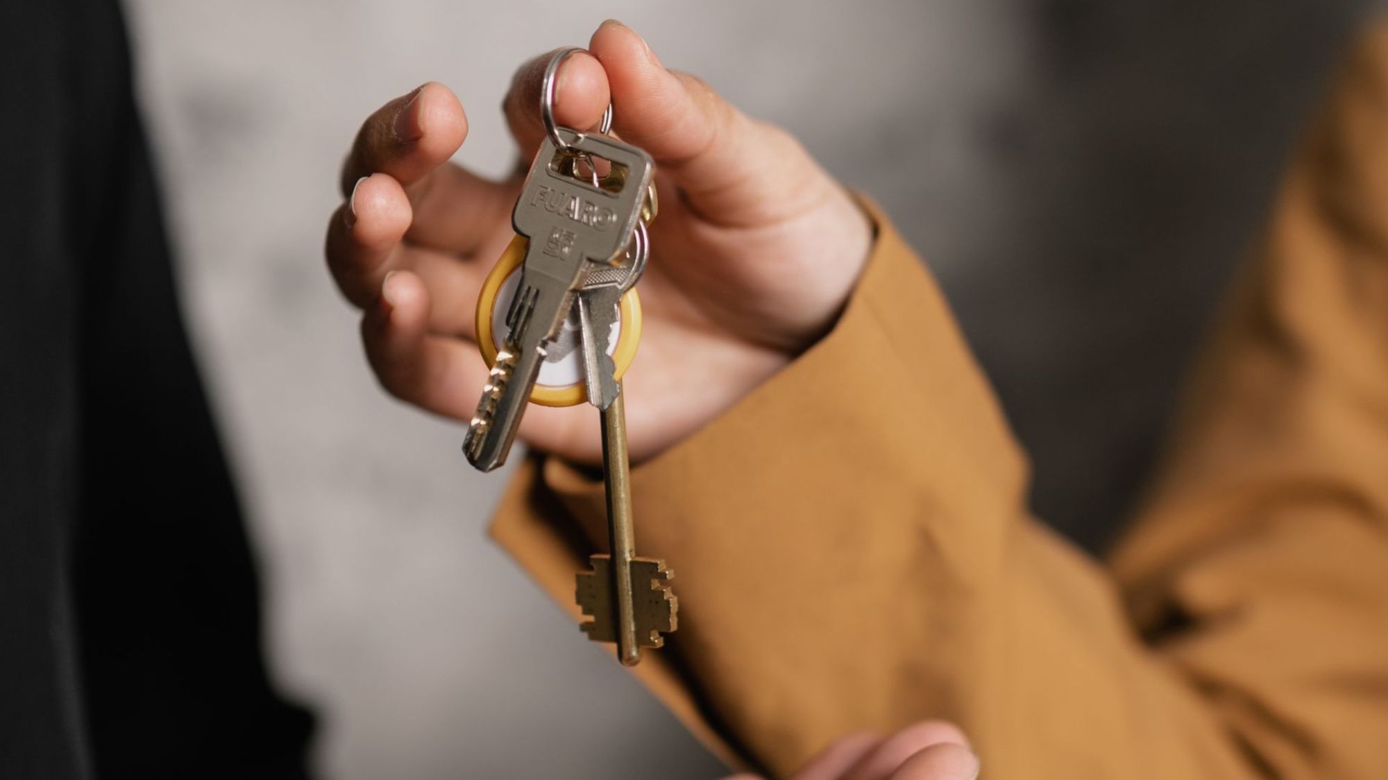 Close-up of a modern security door lock serving as the featured header image to introduce this Brighton homeowner guide.
