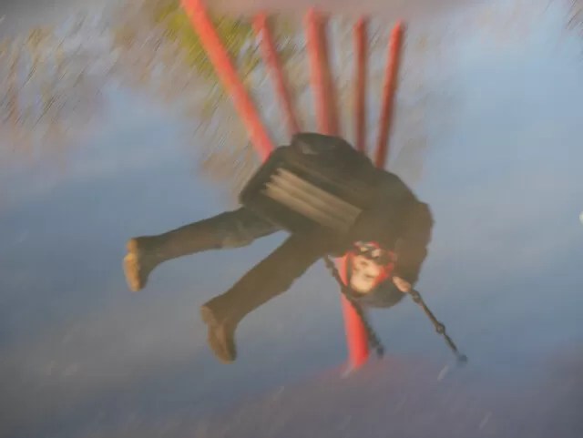swinging reflection in puddles