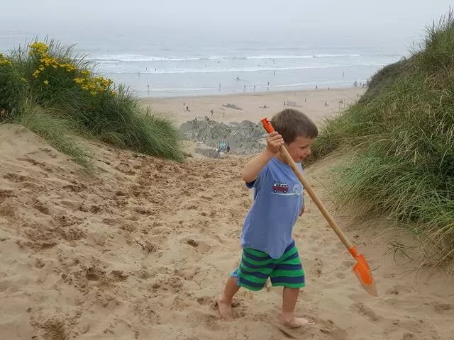 playing at the top of sand dunes