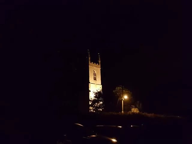 Islip church at night