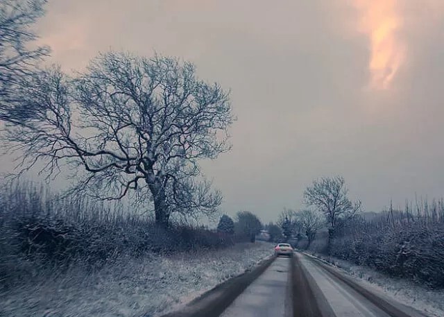 snowing rural road