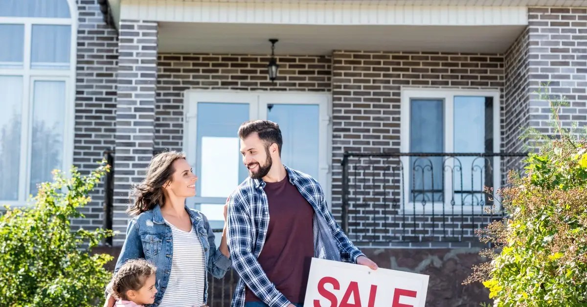 couple in front of their home