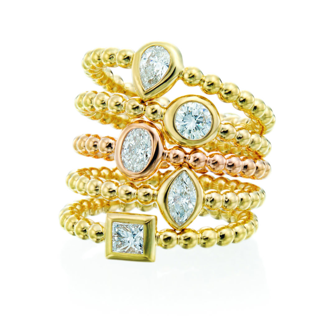 The collection includes easy to wear, everyday pieces like the new assorted Nutmeg Stacking Rings, $2,200 each, and Stich By Stitch Pendulum Sliding Pendant, price upon request (Images Courtesy of Gumuchian)