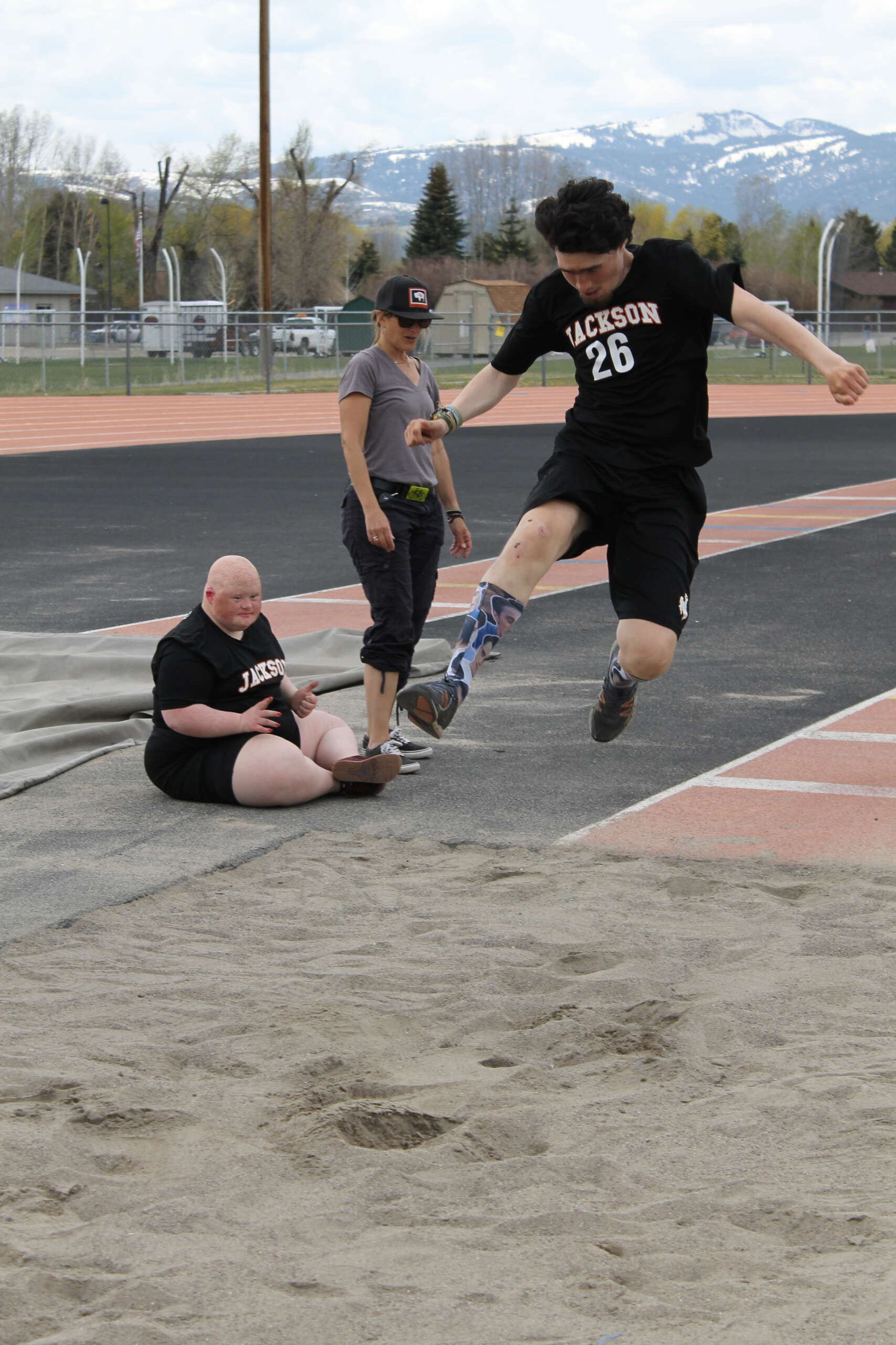 Marcus Olson gets air during the running long jump competition. Photo: TCSD