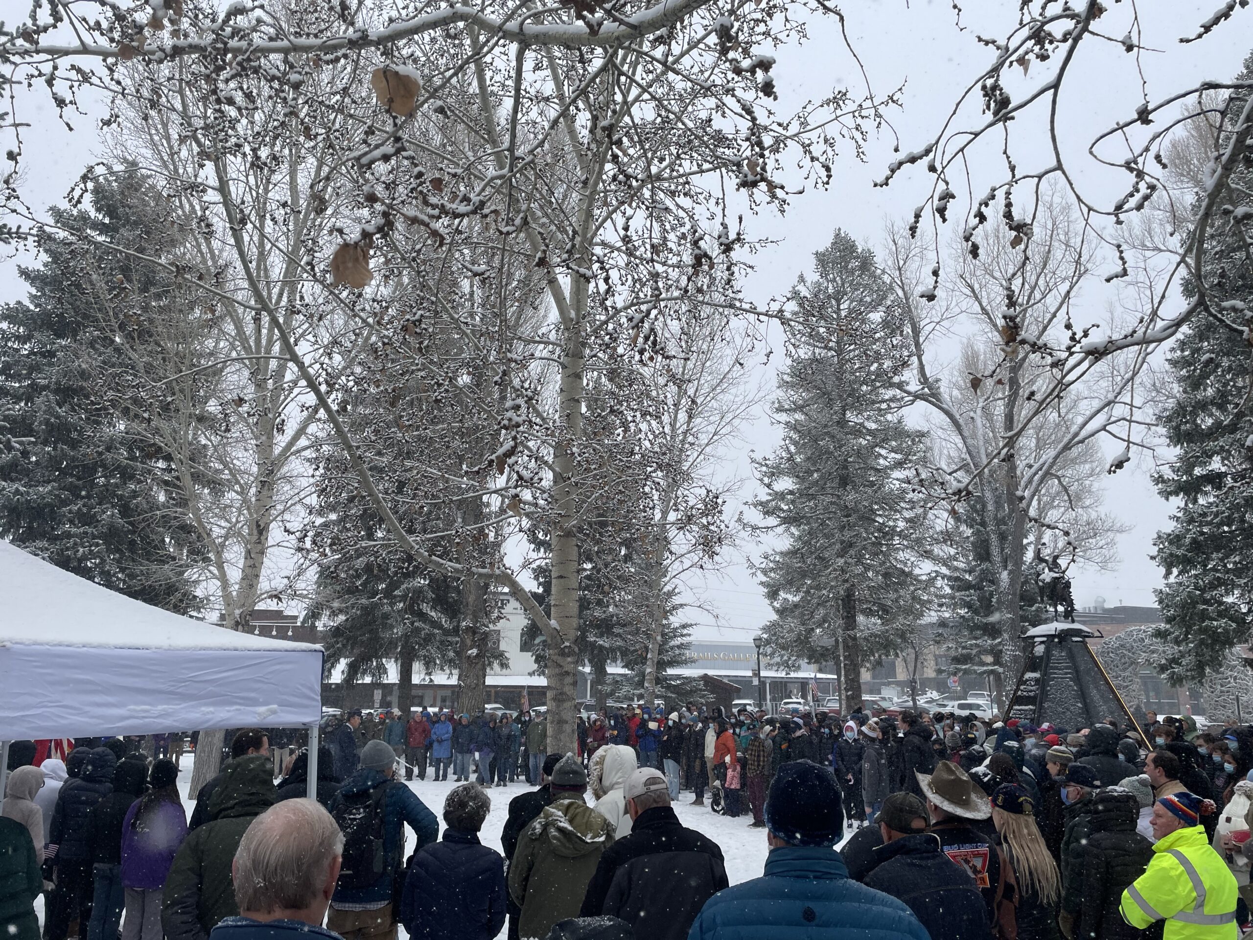 A large crowd gathered in spite of the snowy conditions. Photo: Lindsay Vallen // Buckrail
