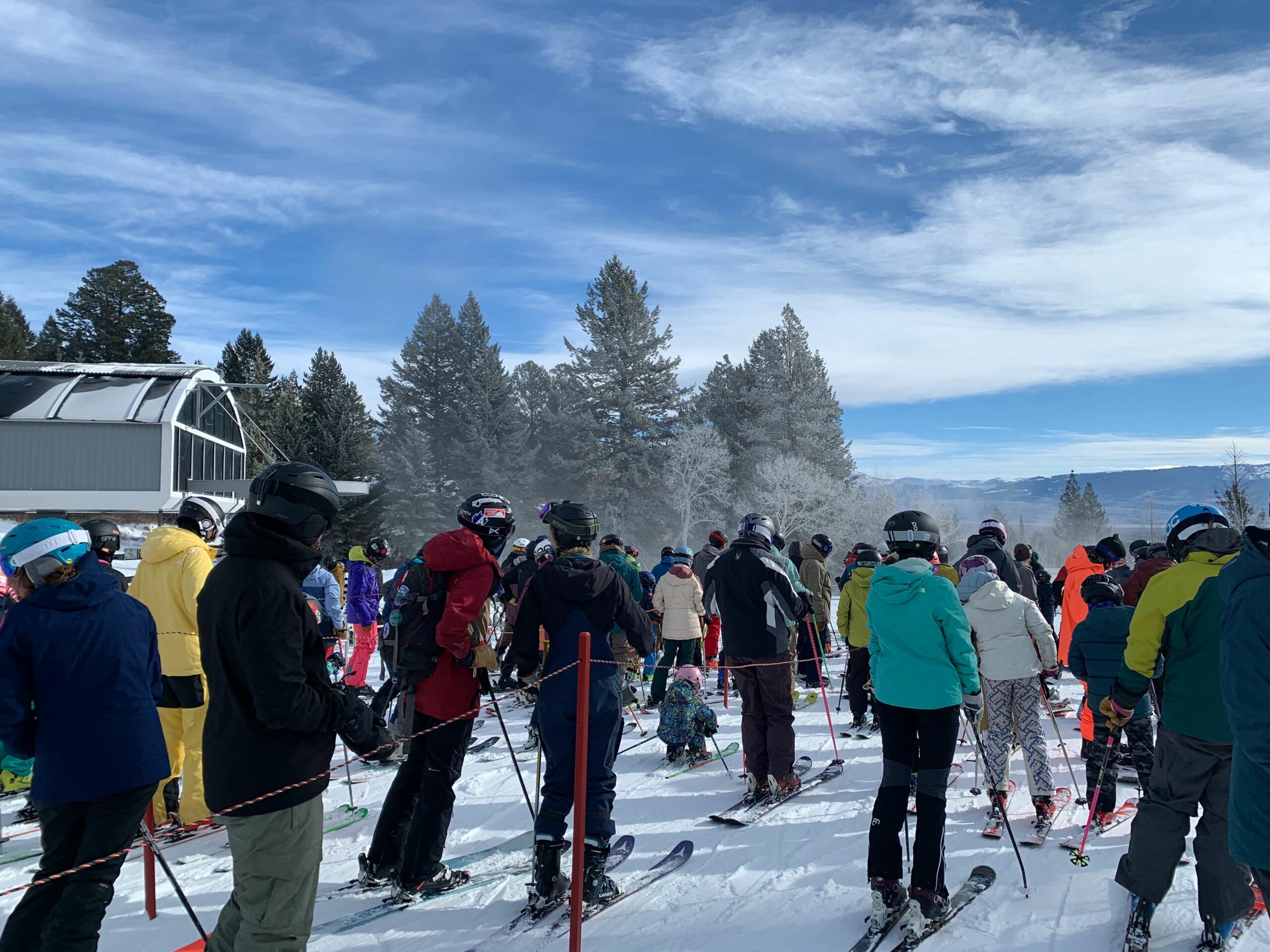 Skiers and riders wait in line at Apres Vous lift. Photo: Nick Sulzer // Buckrail