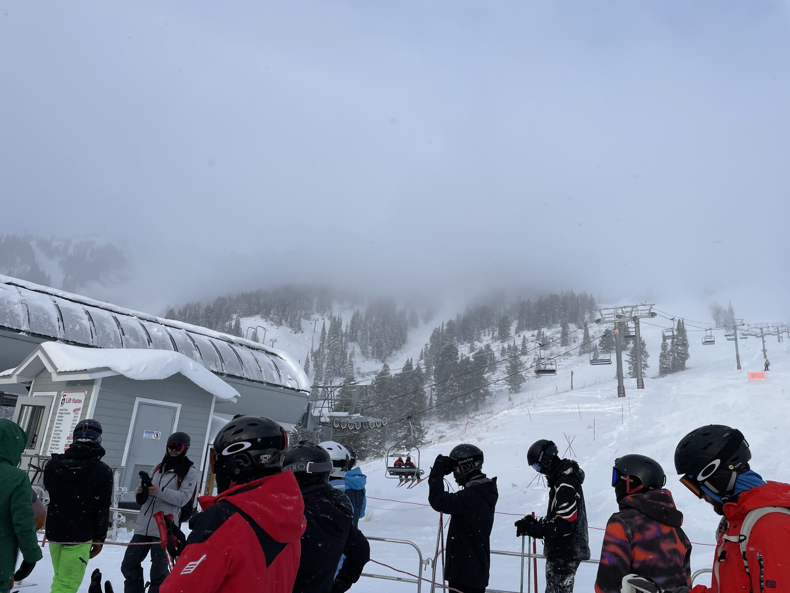 A couple of JHMR employees grab first chair at Casper lift. Photo: Lindsay Vallen // Buckrail