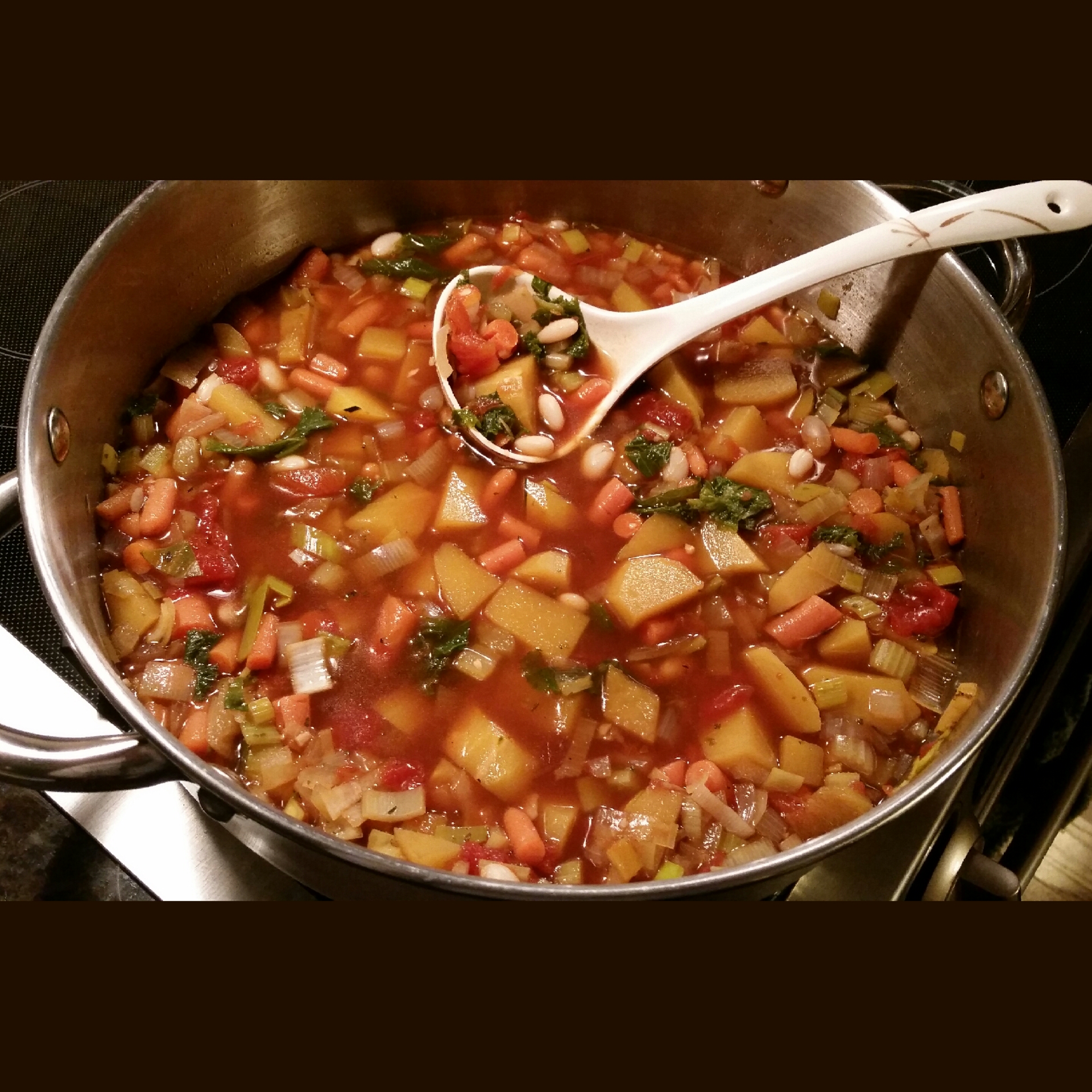 Soup's On... acorn squash, mustard greens, carrots, white beans, leeks, and onions