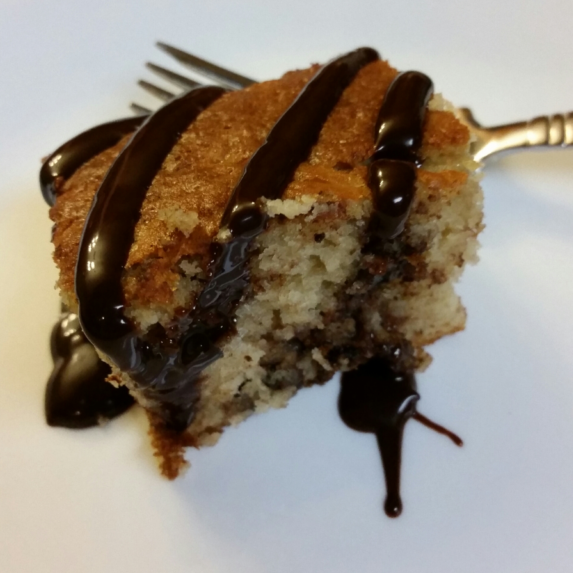 Dessert Time :) - Banana Split Cake Simply Nature organic vanilla cake mix filled with strawberry preserve, mashed banana, and dark chocolate chips with a drizzle of TraderJoes organic midnight moo chocolate syrup