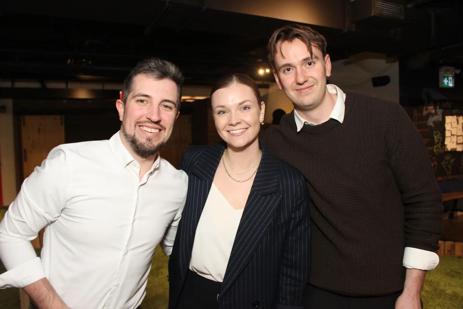 Three professionals at fun event