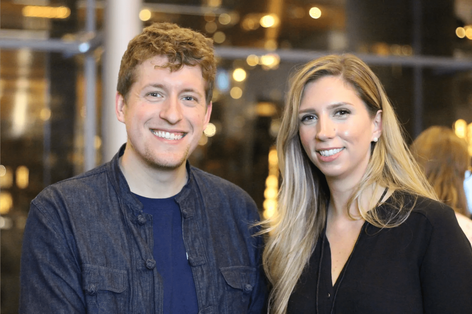 Two co-workers at event