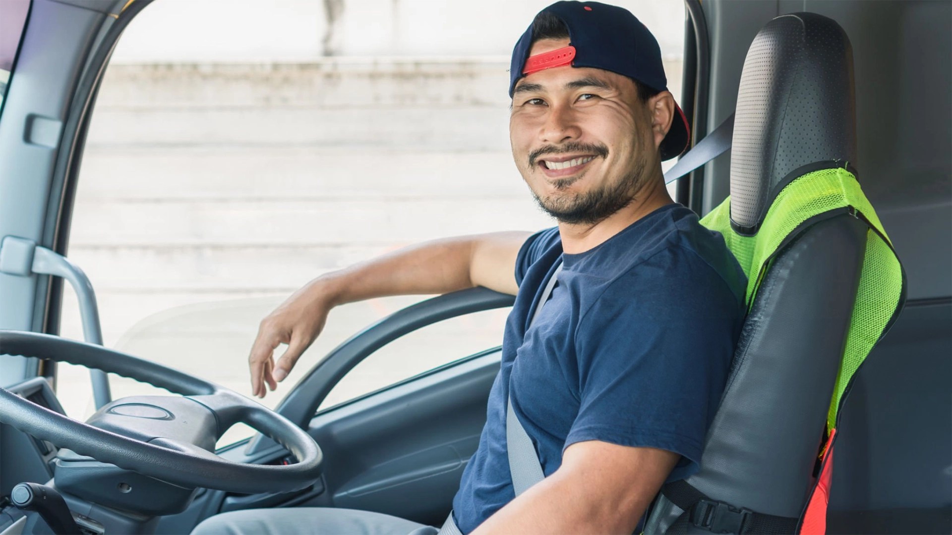 Private driver smiling