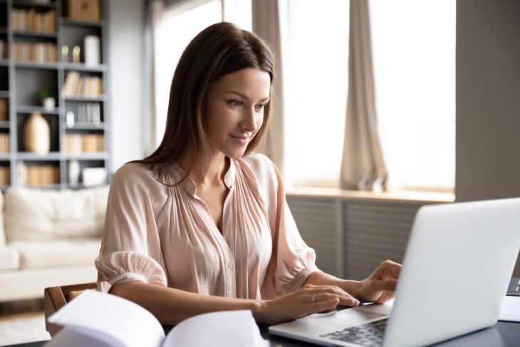 Working remotely, girl on computer