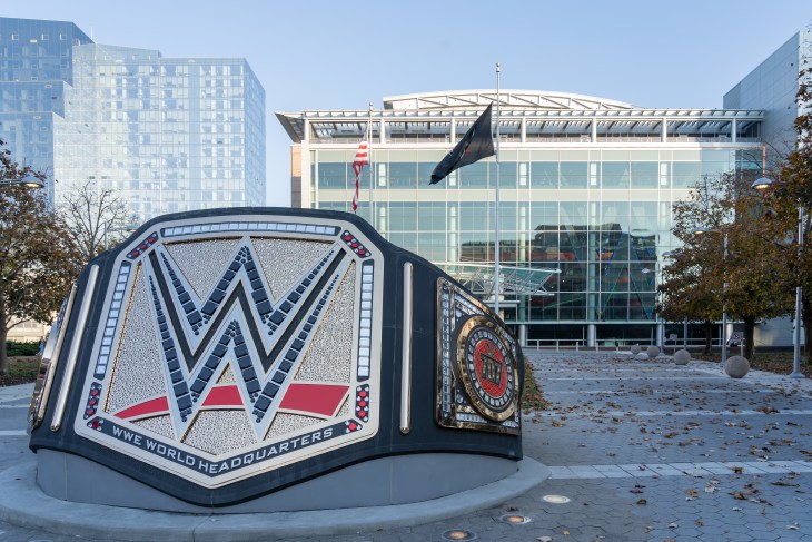 A sculpture of a championship belt in front of the offices of WWE on Washington Boulevard in Stamford, Connecticut, on November 7, 2023. WWE is an American professional wrestling promotion.