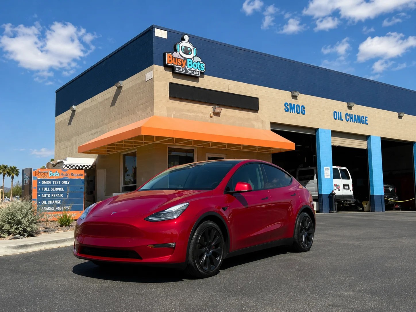 Tesla receiving cooling-system service at Busy Bots Auto Repair in Las Vegas