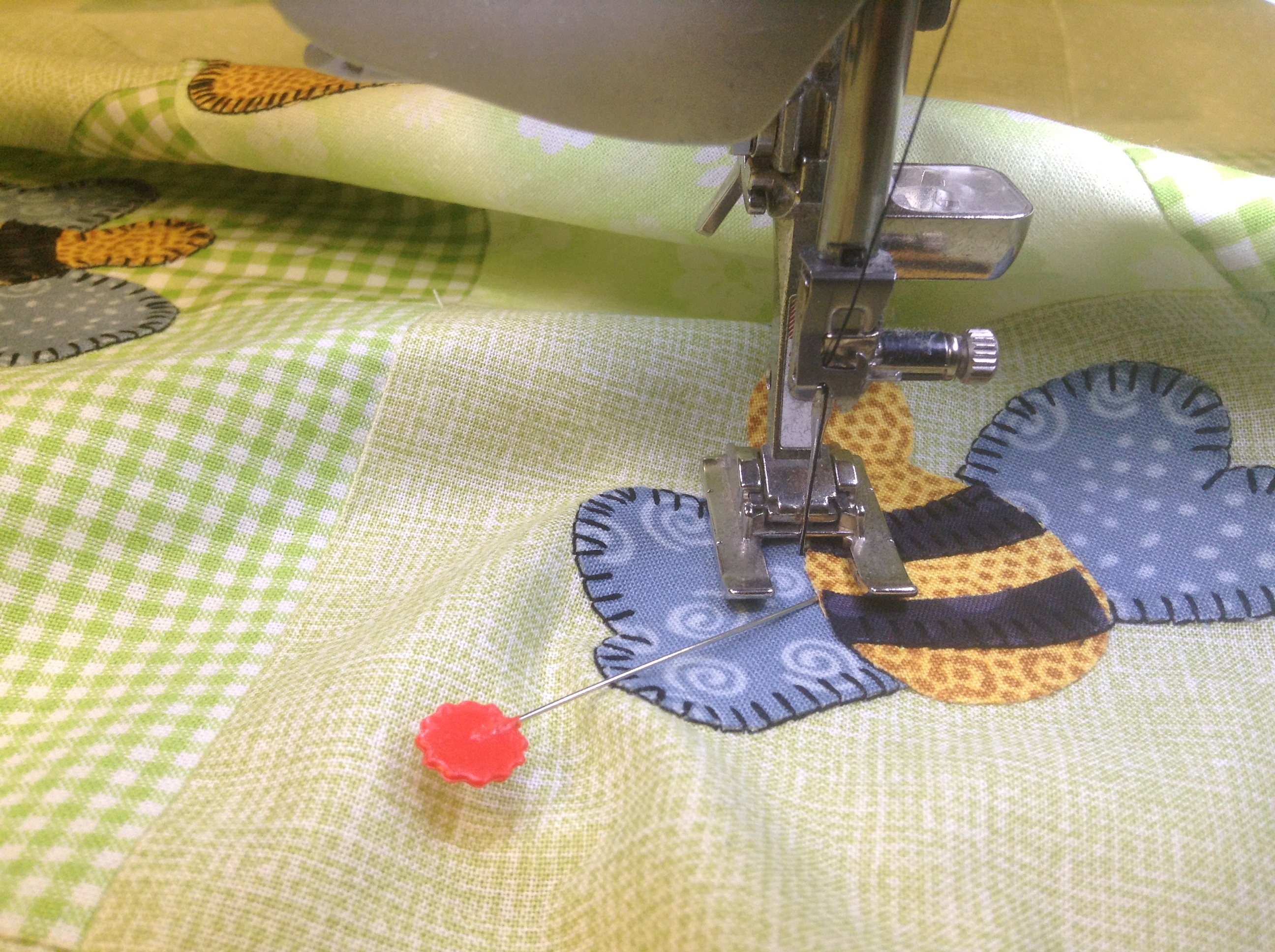 Hot off the needle - Winnie the Pooh quilt machine applique