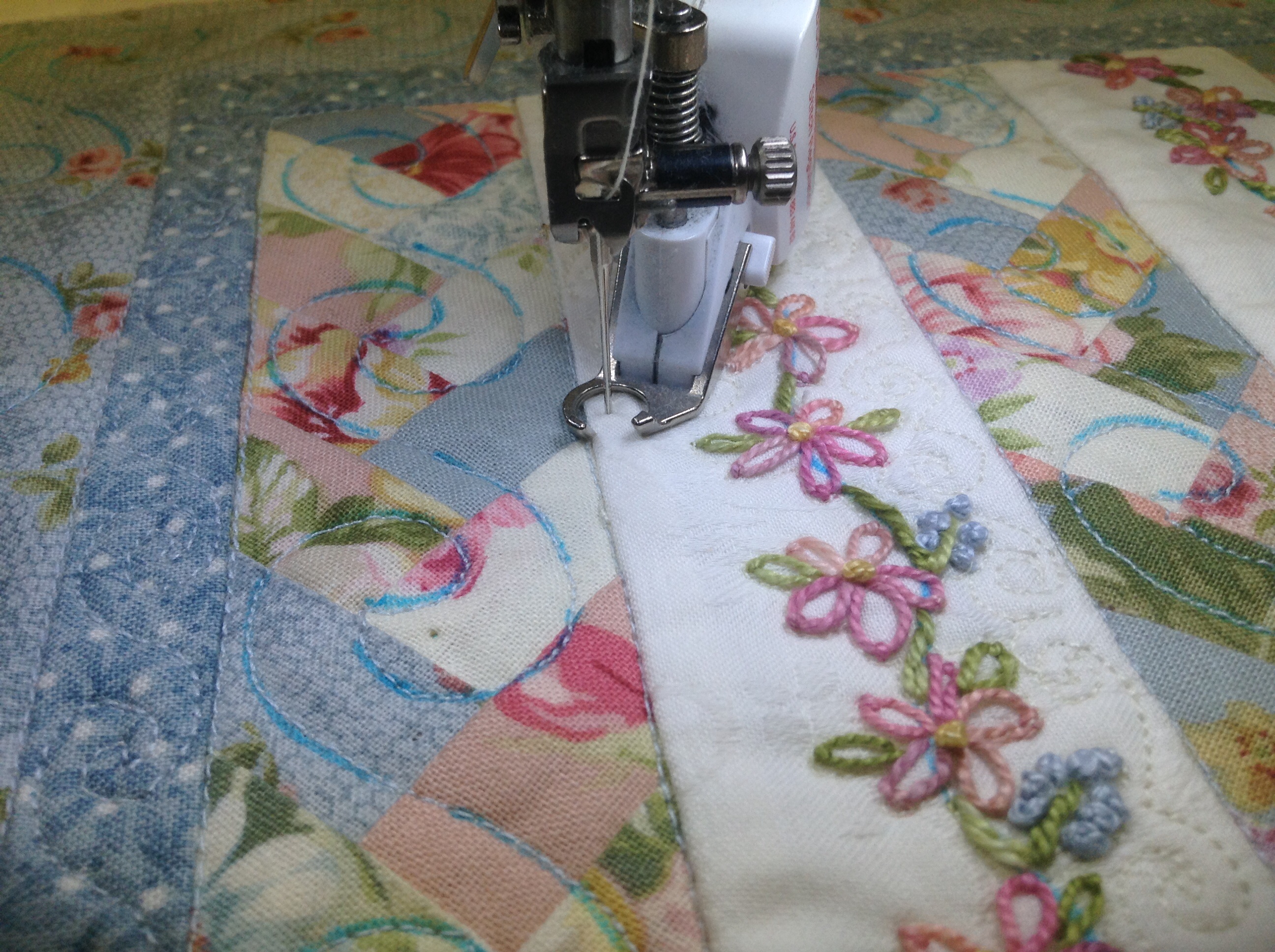 Quilting free motion design using a free motion foot .