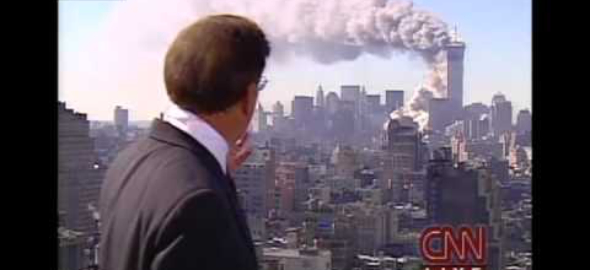 September 11, 2001 Aaron Brown looking out at the burning World Trade Center