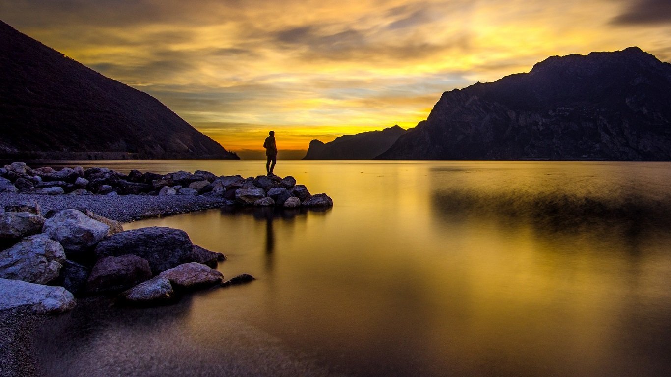Man Standing on a Lake