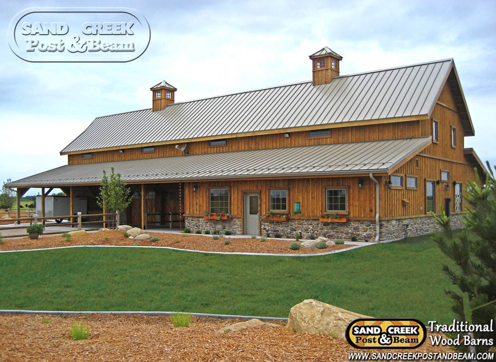 We may earn commission on some of the items you choose to buy. Western - Sand Creek Post & Beam - Traditional Wood Barns