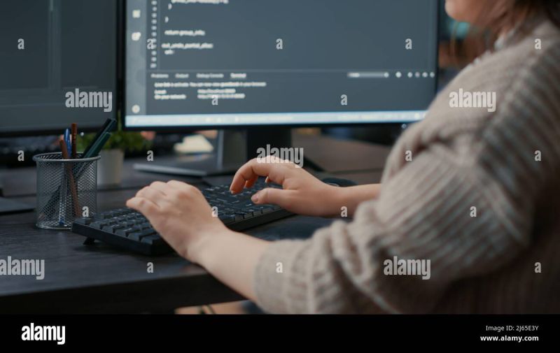 Software Developer Coding On A Computer Hands Typing On Keyboard With Programming Code On - Best Ocean Patterns in 4K