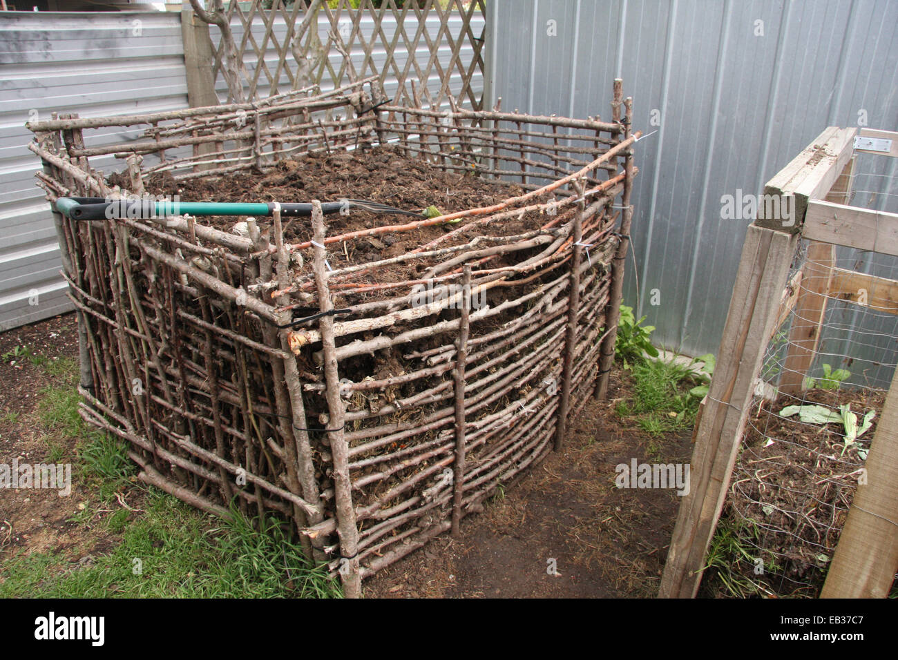 Backyard compost bin stock photo