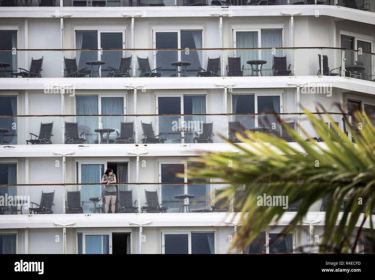 People Looking Out From Cabins On Celebrity Eclipse Cruise