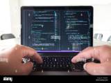 Programmer Profession Man Writing Programming Code On Laptop Computer