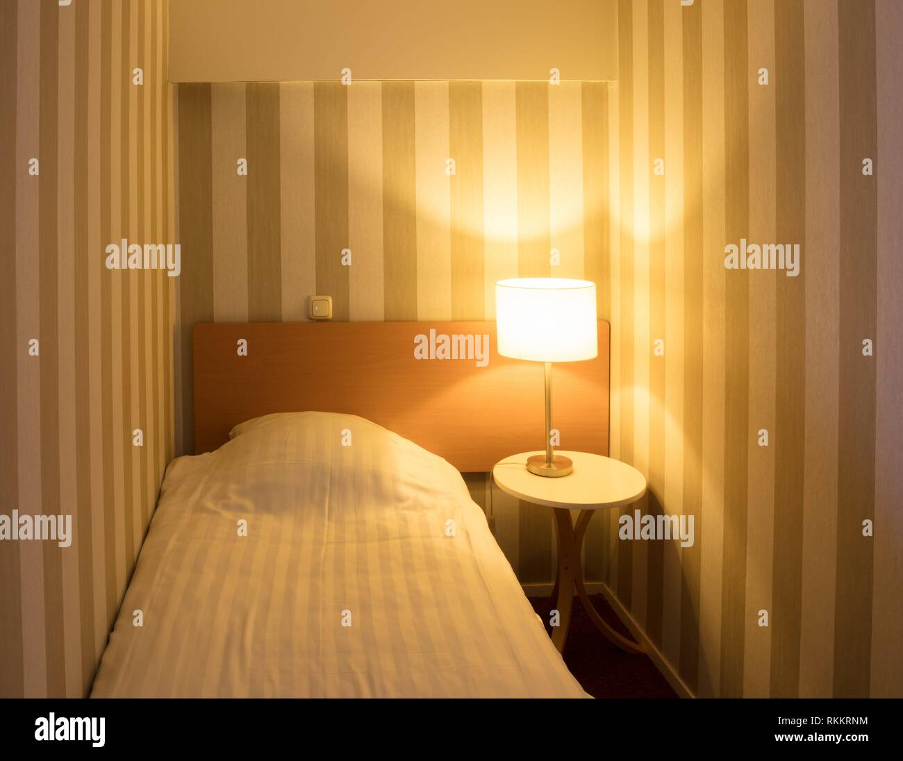 Simple Small Hotel Room Classic Single Bed Stock Photo Alamy