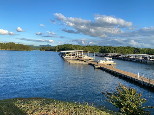 Covered docks on Lake Blue Ridge with the North Georgia mountains in the background