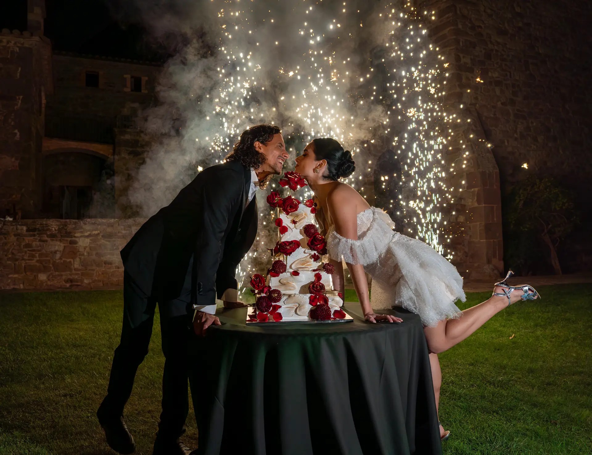 Couple sharing a wedding cake moment at a destination wedding