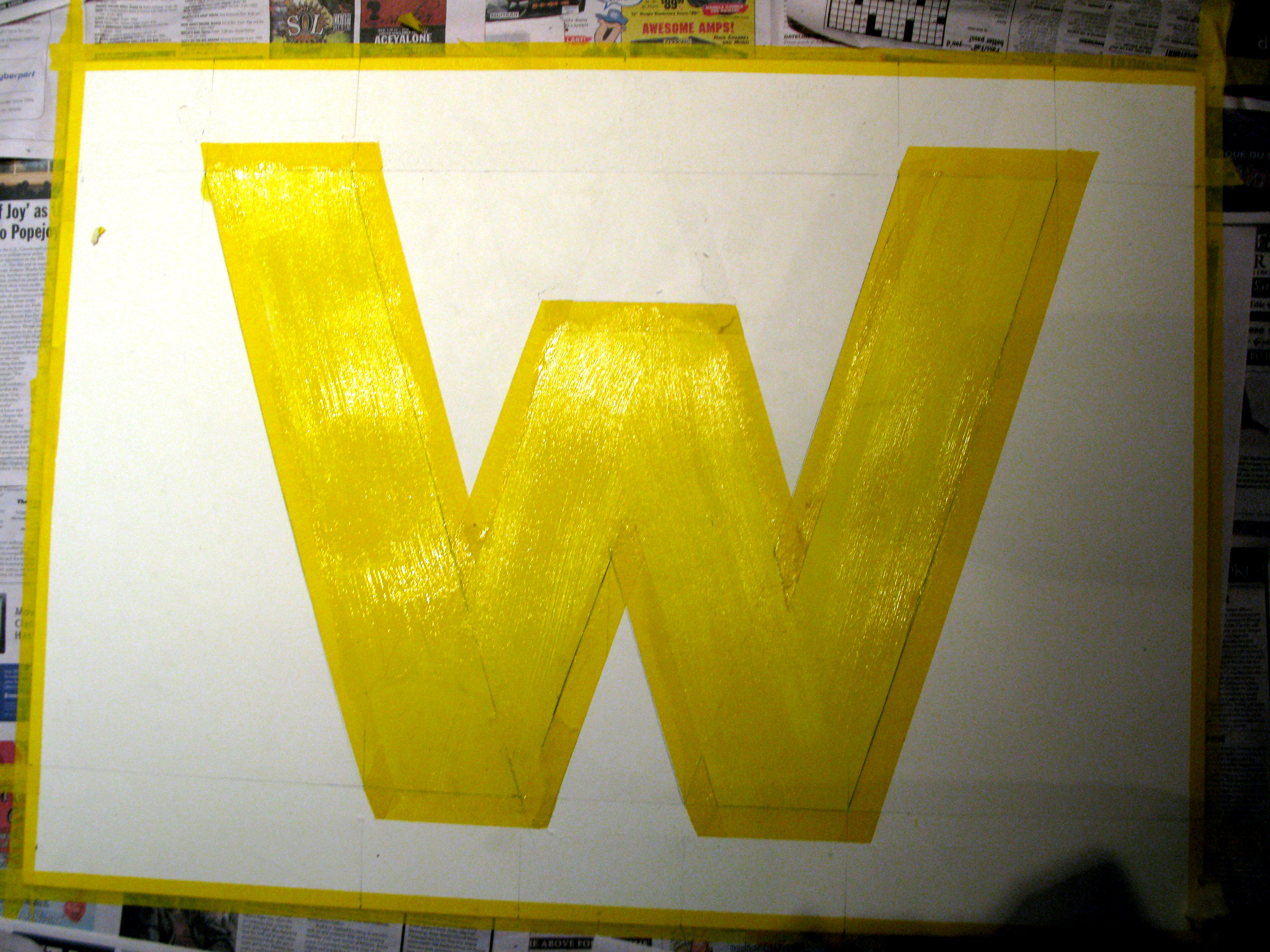 W in yellow