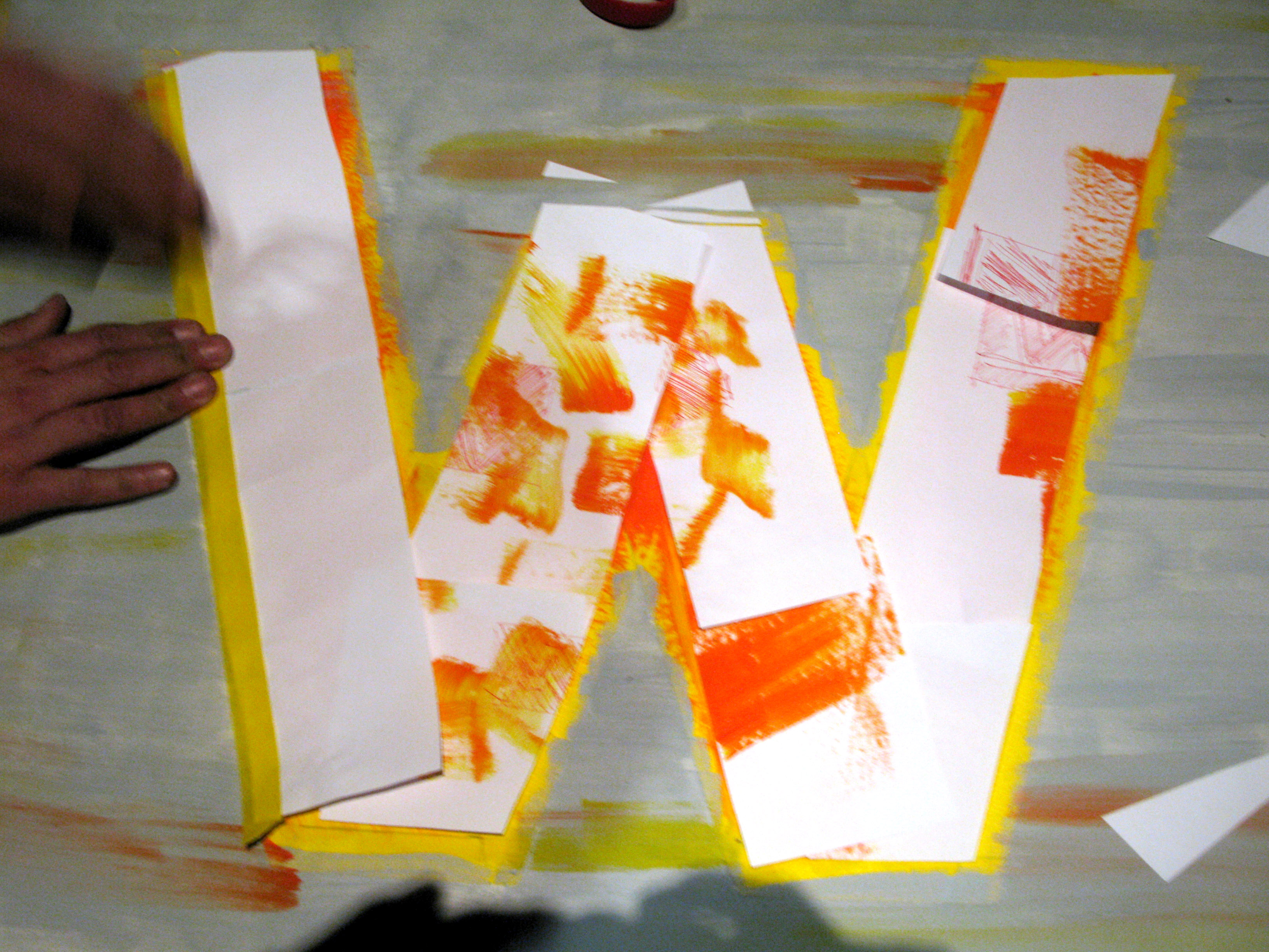 Ah! Now we cover the perfectly gradiated W with paper so that it won't be splattered when we go all Pollock on this shit.