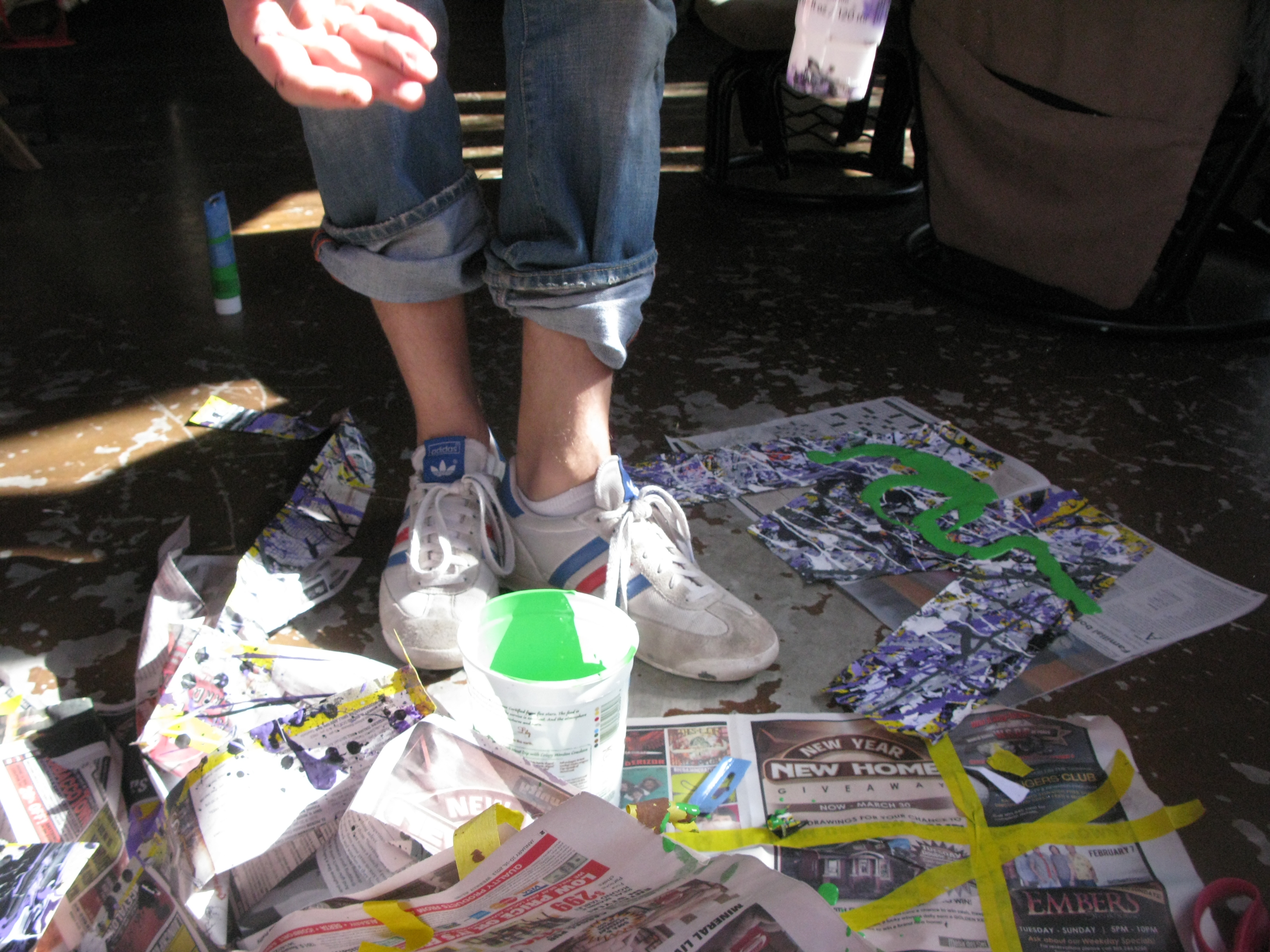 David starts to mix the green paint so that it can be drizzled perfectly across the page like a special icing!