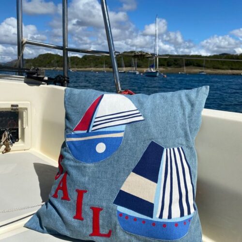 pretty cushion on the deck of a sailing boat