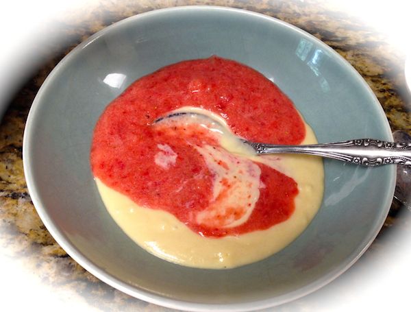 adding strawberries into the batter