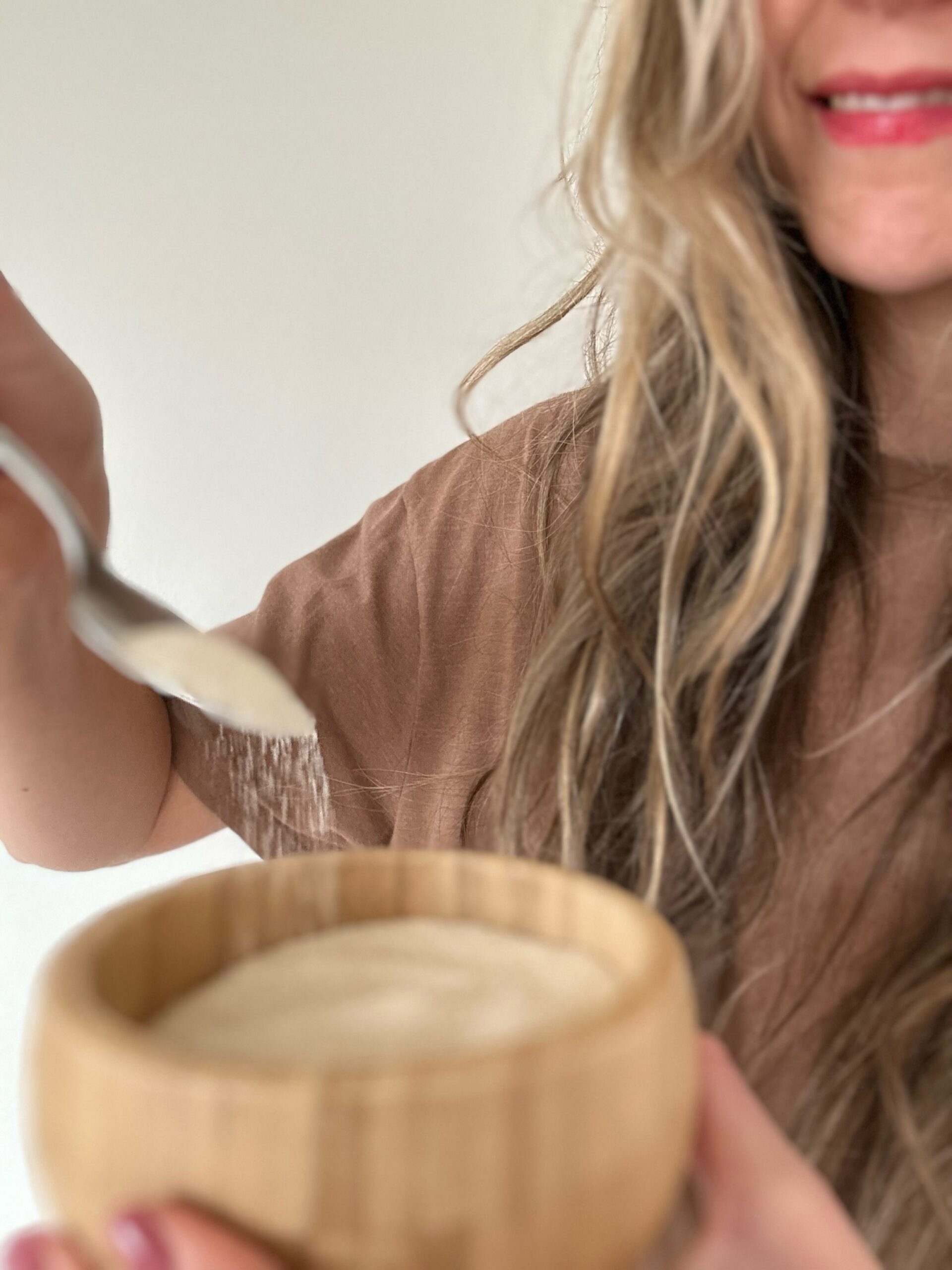 Author holds bowl of sugar