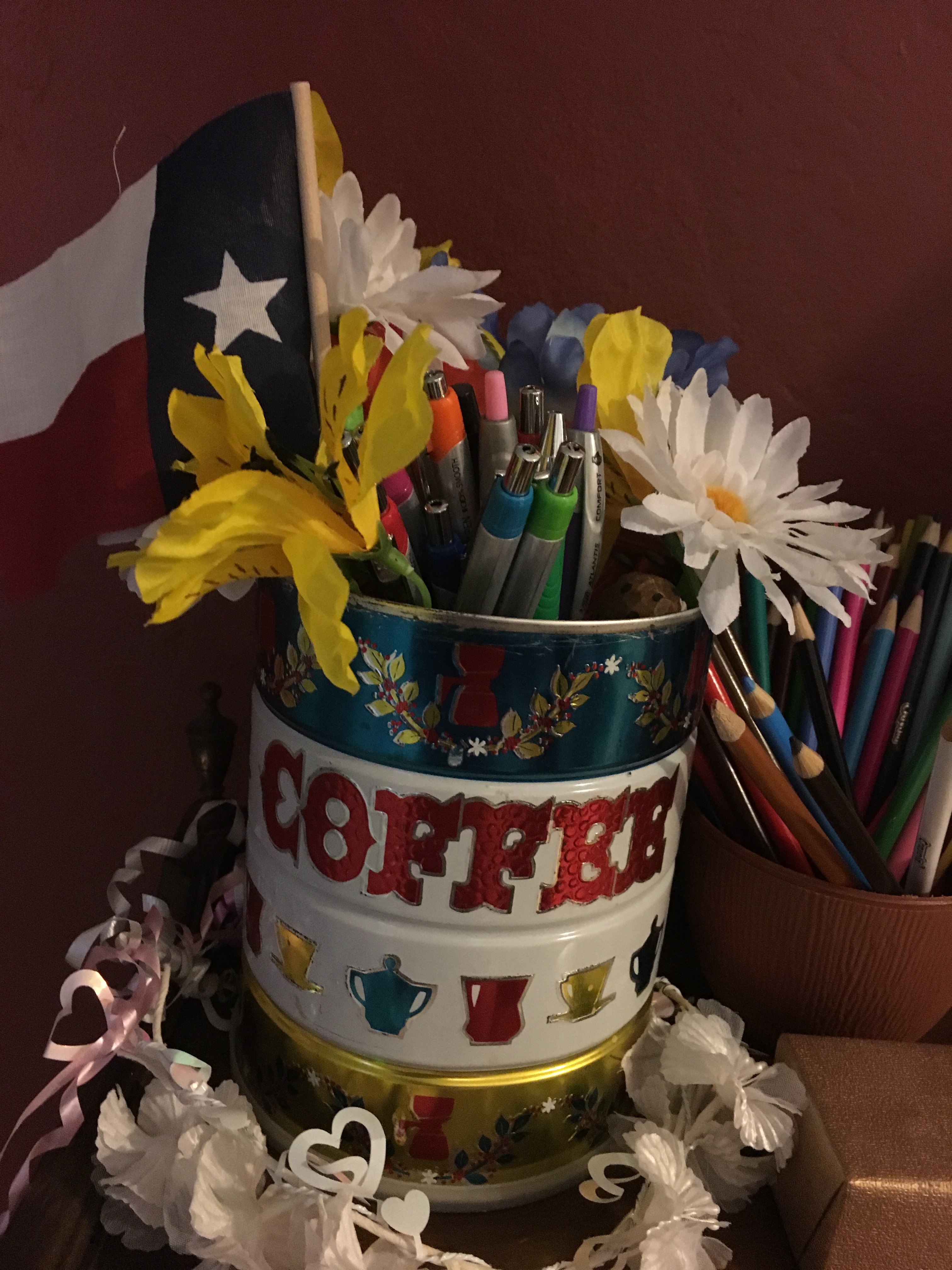 Artistic Coffee Cans make great pencil and pen containers.